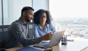 A woman discusses her case with her family law attorney. Knowing the right questions to ask a family lawyer can help you make informed decisions, protect your rights, and prepare for what’s ahead.
